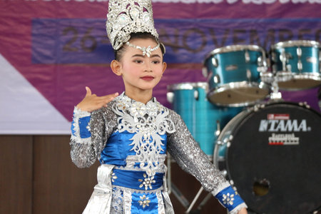 Jakarta, Indonesia in November 2022. Young children ranging from kindergarten to elementary school are taking part in the National Archipelago dance competition. The dances and clothing displayed are typical dances from regions in Indonesia.のeditorial素材