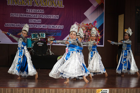 Jakarta, Indonesia in November 2022. Young children ranging from kindergarten to elementary school are taking part in the National Archipelago dance competition. The dances and clothing displayed are typical dances from regions in Indonesia.のeditorial素材