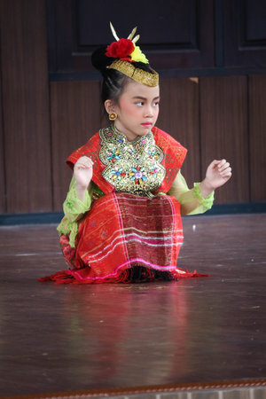 Jakarta, Indonesia in November 2022. Young children ranging from kindergarten to elementary school are taking part in the National Archipelago dance competition. The dances and clothing displayed are typical dances from regions in Indonesia.のeditorial素材