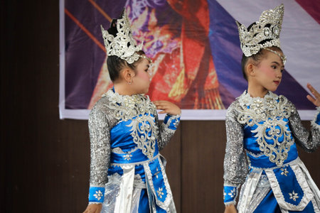 Jakarta, Indonesia in November 2022. Young children ranging from kindergarten to elementary school are taking part in the National Archipelago dance competition. The dances and clothing displayed are typical dances from regions in Indonesia.のeditorial素材