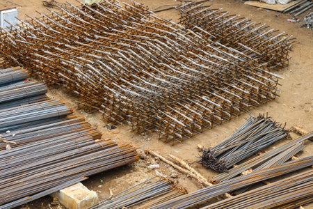 Stockyard steel reinforcement for bridge construction. The iron is bent and cut according to a plan or shop drawing as a work reference so that it can be immediately ready for installation in the field.の写真素材