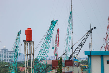 Jakarta, Indonesia in November 2022. You can see a crane being parked, you can see from the booms made of steel in the shape of a truss that looks very much.の写真素材