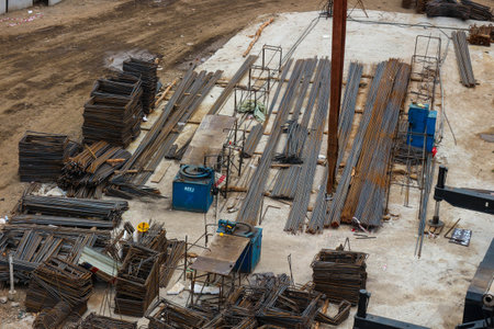 Stockyard steel reinforcement for bridge construction. The iron is bent and cut according to a plan or shop drawing as a work reference so that it can be immediately ready for installation in the field.の写真素材