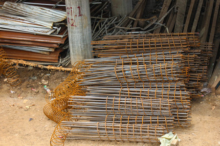 Stockyard steel reinforcement for bridge construction. The iron is bent and cut according to a plan or shop drawing as a work reference so that it can be immediately ready for installation in the field.の写真素材