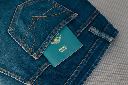 An Indonesian citizenship passport in a jeans pocket. This photo is suitable as an illustration of traveling abroad.の写真素材