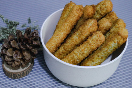 Chicken finger nuggets or chicken nuggets in the form of sticks. Soft chicken meat wrapped in crispy flour.の写真素材