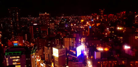 Osaka, Japan in July 2019. Nighttime view of the city of Osaka or 'The Nation's Kitchen,' from different heights and angles aboard the HEP FIVE Ferris Wheel in Kansai. It's one of the iconic landmarks of Umeda.のeditorial素材