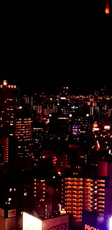 Osaka, Japan in July 2019. Nighttime view of the city of Osaka or 'The Nation's Kitchen,' from different heights and angles aboard the HEP FIVE Ferris Wheel in Kansai. It's one of the iconic landmarks of Umeda.のeditorial素材