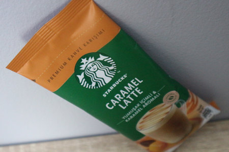 Bekasi, Indonesia on July 2022. Copy space starbucks caramel latte sachet, Starbucks premium instant coffee sachet original from Turkey. We can enjoy Starbucks coffee easily from home.のeditorial素材