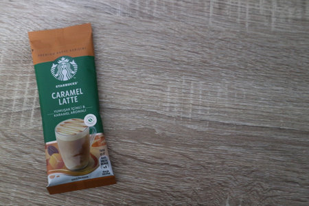 Bekasi, Indonesia on July 2022. Copy space starbucks caramel latte sachet, Starbucks premium instant coffee sachet original from Turkey. We can enjoy Starbucks coffee easily from home.のeditorial素材