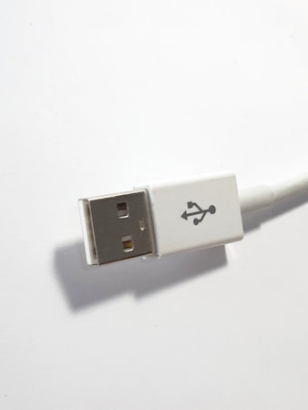 This is isolated white a photo of the USB white cable.の写真素材