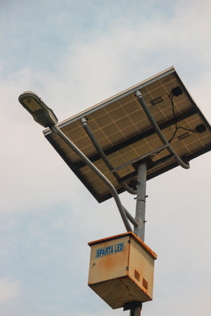 Solar Public Street Lighting (PJUTS) is a lighting solution for roads and areas that are not within the PLN network area or for lighting cost efficiency. Using energy-saving LED lights with electricity supplied from batteries that were previously charged with sunlight through solar panelsの写真素材