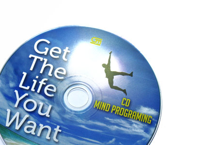 Jakarta, Indonesia in July 2022. Isolated white photo of the Compact Disc or CD of the book Get the life you want by Richard Bandler, co-creator of renowned NLP and mentor of Paul McKenna, believes you can be anyone you want.のeditorial素材