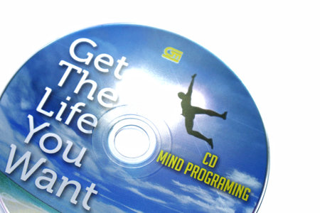 Jakarta, Indonesia in July 2022. Isolated white photo of the Compact Disc or CD of the book Get the life you want by Richard Bandler, co-creator of renowned NLP and mentor of Paul McKenna, believes you can be anyone you want.のeditorial素材