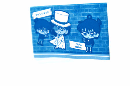 Tokyo, Japan in July 2019. A guide book contained in a 100 yen toy capsule containing a rubber key chain with a string with a picture of Detective Conan and Kaito Kid. Comic created by Aoyama Gosho.のeditorial素材