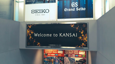 Osaka, Japan on April 8, 2019. Photo of an immigration checkpoint for foreigners at Kansai International Airport (Kansai Kokusai KÅ«kÅ). Several Asian tourist were walking towards immigration.のeditorial素材