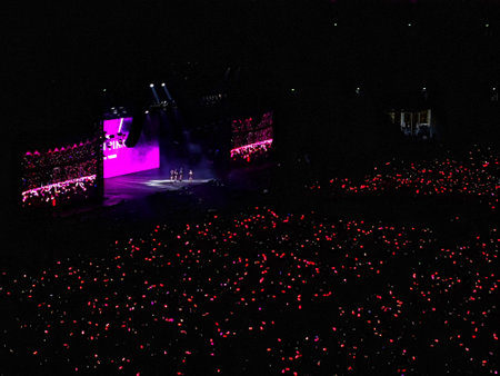 Jakarta, Indonesia on March 2023. The atmosphere of blackpink's concert in Jakarta, Born in Pink. The ambience of pink lights dominated, very crowded, exciting and fun.のeditorial素材