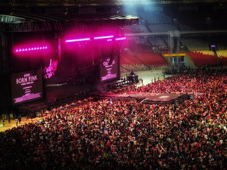 Jakarta, Indonesia on March 2023. The atmosphere of blackpink's concert in Jakarta, Born in Pink. The ambience of pink lights dominated, very crowded, exciting and fun.のeditorial素材