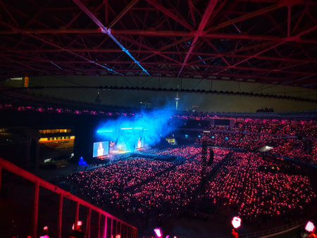Jakarta, Indonesia on March 2023. The atmosphere of blackpink's concert in Jakarta, Born in Pink. The ambience of pink lights dominated, very crowded, exciting and fun.のeditorial素材