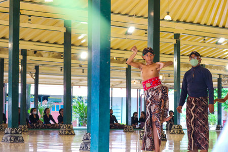 Yogyakarta, Indonesia on October 2022. Abdi dalem mataya, courtiers of the Yogyakarta Palace who are dancers. These courtiers are practicing the Serimpi dance to the accompaniment of gamelan strains.のeditorial素材