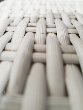 Close up photo of white artificial rattan wicker. Used for chairs.の写真素材