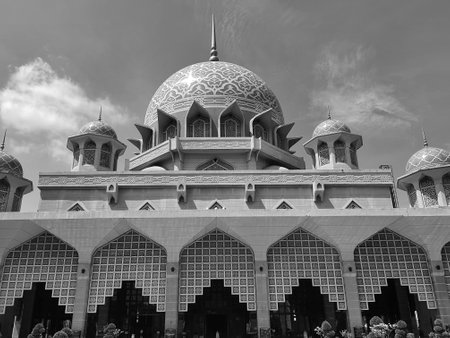 Putra Jaya, Malaysia in May 21, 2023. Putra Mosque or in Malay is Masjid Putre is a mosque that was built in 1997 using rose red granite and consists of three functional areas; prayer room, mosque yardのeditorial素材