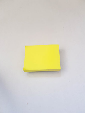 Isolated white photo of a yellow sticky note. These sticky notes look floating. It is suitable for...