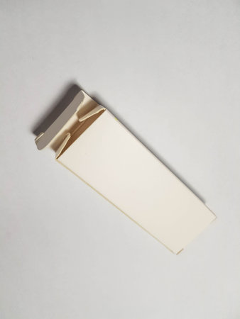 Isolated white photo of a rectangular white packaging box. It is suitable for mock up your packaging products.の写真素材