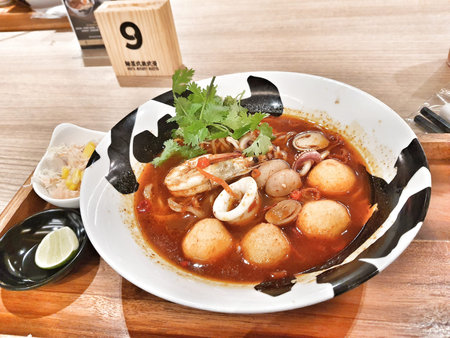 One of the signature ramen from a ramen specialist restaurant. Seafood Tom Yum Ramen. Ramen with...