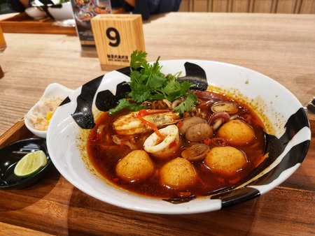 One of the signature ramen from a ramen specialist restaurant. Seafood Tom Yum Ramen. Ramen with...