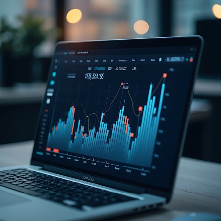 Laptop displaying a financial chart provides data for analysis and strategic planning, ideal for business and investment visuals.の素材