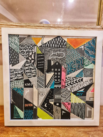 Bogor, Indonesia on 25 Oct 2025. Colorful abstract cityscape collage inside a frame, geometric shapes and patterns suitable for modern home decor or gallery display.のeditorial素材