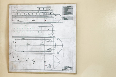 Istanbul, Turkey on 12 July 2022. Detailed boat blueprint hangs on a wall, illustrating design and engineering perspectives Great for nautical and technical backgrounds.のeditorial素材