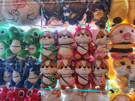 Da Nang, Vietnam on 13 May 2025. Ba Na Hills. Colorful and cuddly animal plush toys are displayed on a store shelf, perfect for gifts or collectors looking for playful items.のeditorial素材