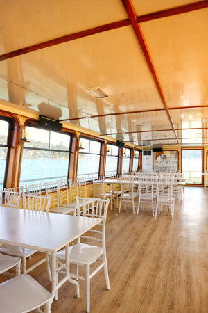 Istanbul, Turkey on 12 July 2022. Bosphorus. Bright interior of a passenger ferry boat features...