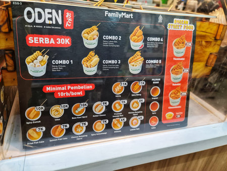 Jakarta, Indonesia on 16 Sept 2025. Colorful food menu showcasing a variety of oden and other Korean street foods with displayed prices, creating a tempting and informative display for commercial restaurant use.のeditorial素材