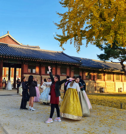 Seoul, South Korea on 10 Nov 2024. A group of people visit a traditional architectural building in...