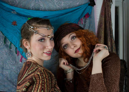 Two beautifiul young women dressed as a gypsysの写真素材