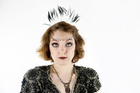 Beautiful young woman dressed as flapper in sequin dress