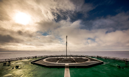 A view of the icy field of the Kara Sea from the nose of a Russian military icebreaker. Arctic...