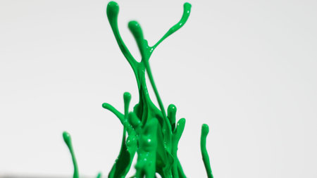 Green abstract paint splatter backgroundの写真素材
