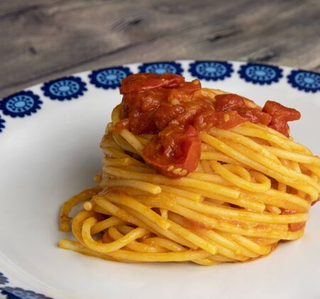 Spaghetti with fresh tomato and pecorino cheeseの写真素材