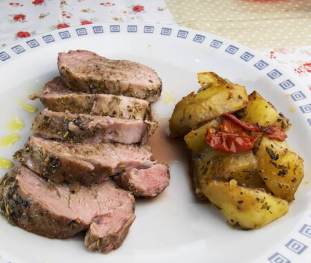 Pork tenderloin with potatoes cooked under vacuum at low temperatureの写真素材