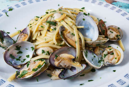 This linguine pasta alle vongole is my Sicilian hubby`s version of pasta with clams, the iconic Neapolitan seafood pasta dish loved by so many!の写真素材