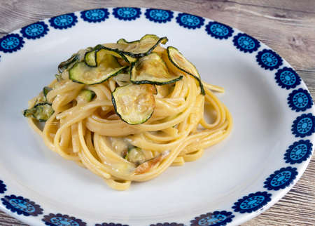 Linguine alla Nerano, typical of Nerano, is a Campania (Italy) dish that will captivate you. Fried zucchini, spaghetti and a typical cheese: Provolone del Monaco!の写真素材