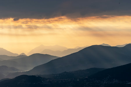View of Lake Maggiore towards Luino at dawn taken from the viewpoint of Premenoの写真素材