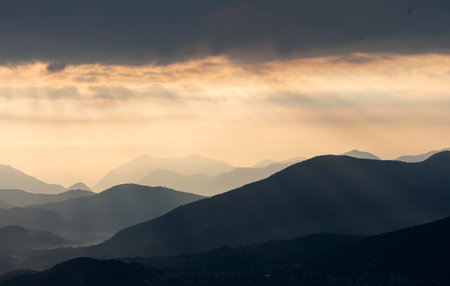 View of Lake Maggiore towards Luino at dawn taken from the viewpoint of Premenoの写真素材