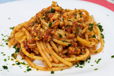 Bucatini pasta with gurnard fish ragout.の写真素材