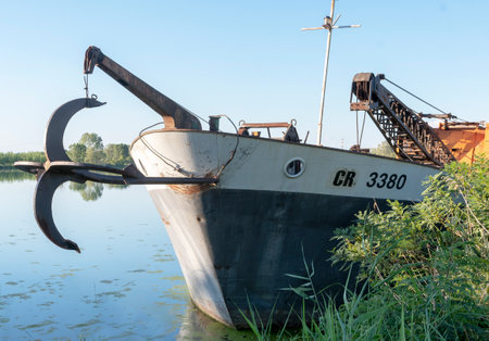 Boat with large anchor, Monticelli d'Ongina, Piacenza. Po river.の写真素材