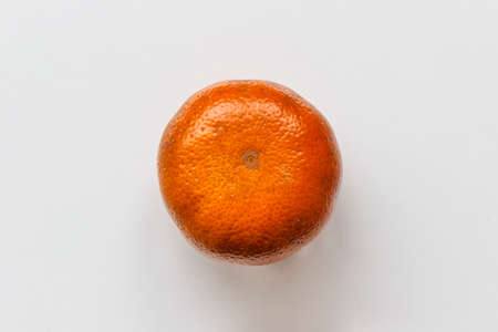Top view of a tangerine on a white backgroundの写真素材